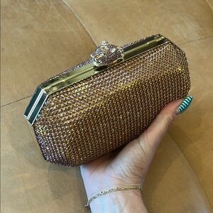 Elegant jaguar Gold and pink stone Clutch Bag